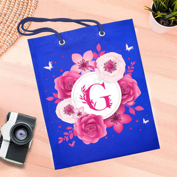 Pembe Çiçek Tasarımlı Mavi Bez Çanta online tasarla